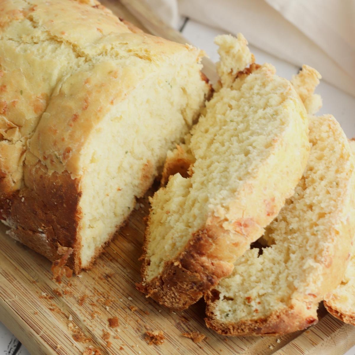 Cheesy garlic bread sliced made in the bread maker for dinner