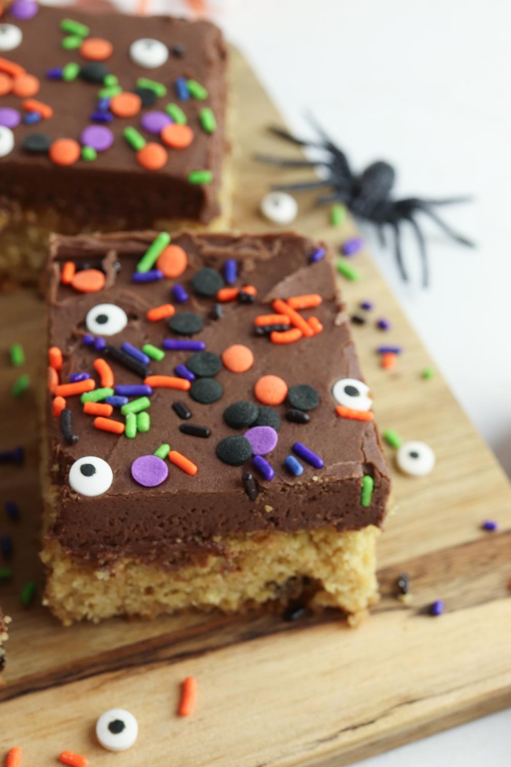 Close up of a single Halloween Cake Bar ready to be eaten.