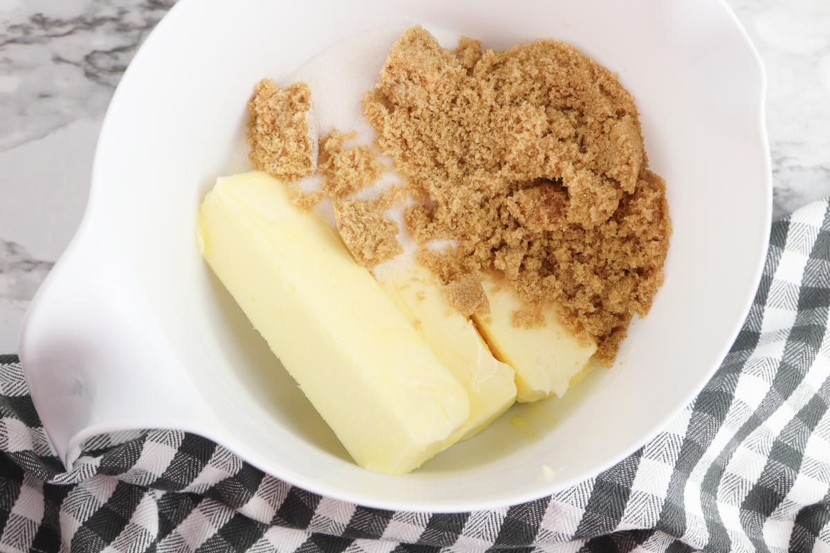 sugars and butter in a mixing bowl to make simple and easy cookie dough.