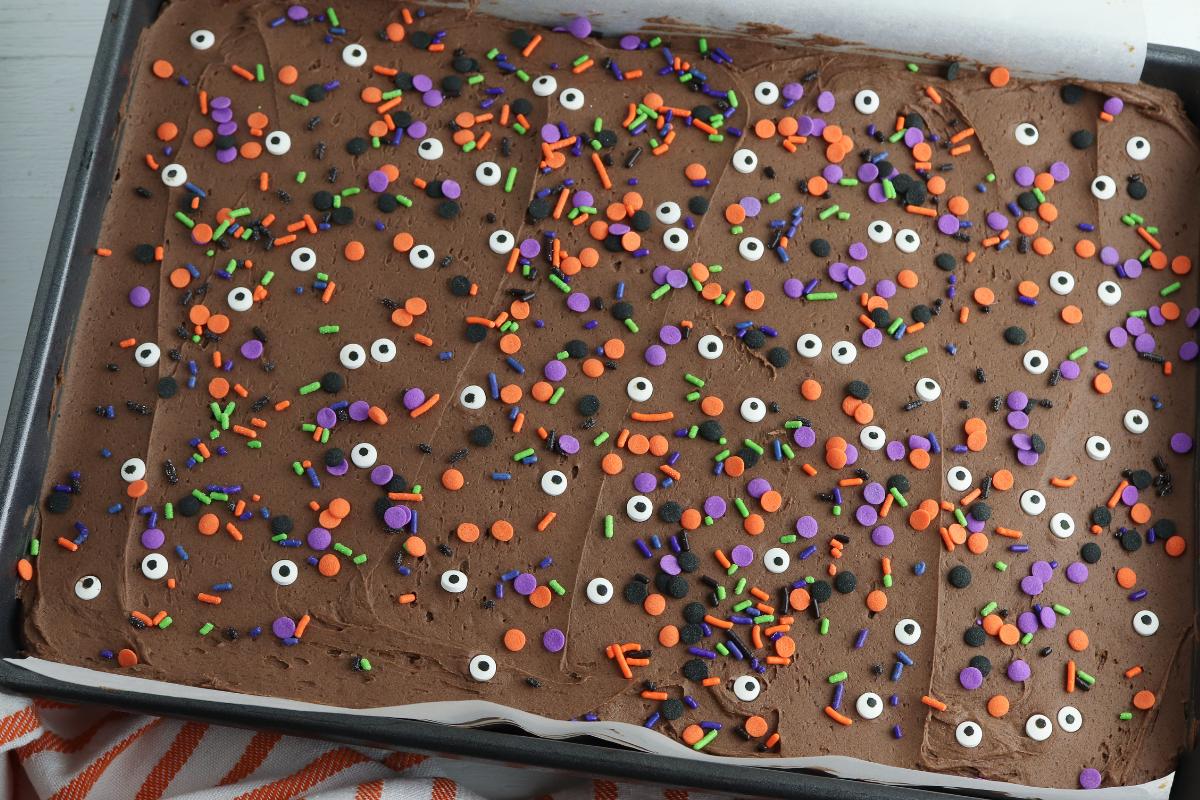 sprinkles and candy eyes added to the top of the Halloween blondies by the family.