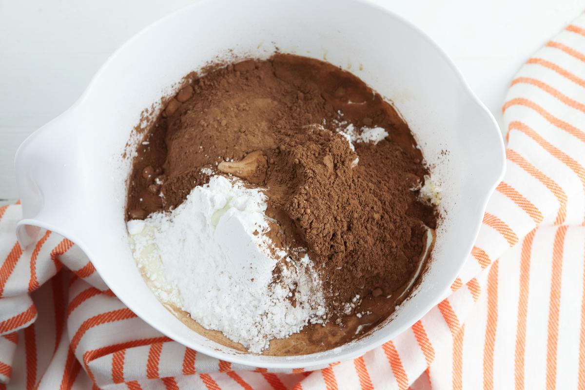 making the chocolate buttercream frosting for the Halloween Blondies.